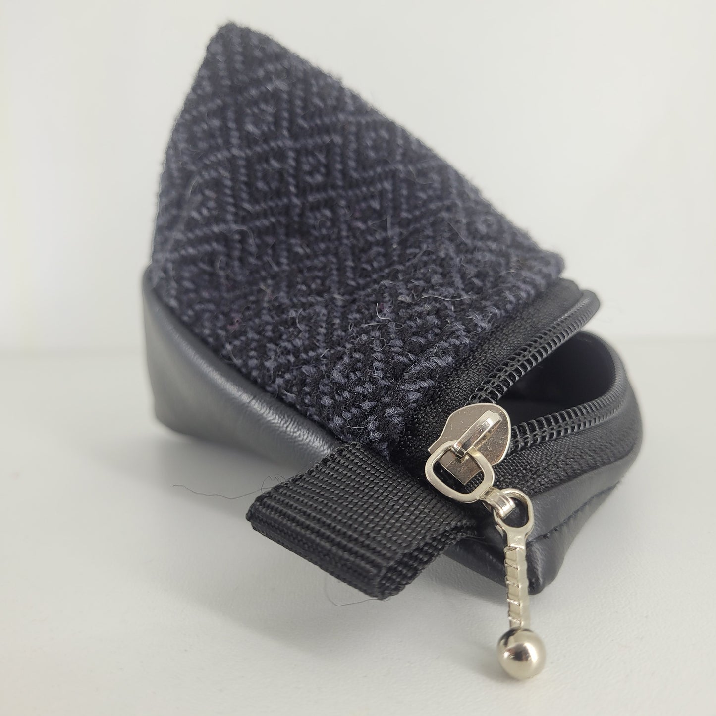 Monedero triangular (Perdiz negro)
