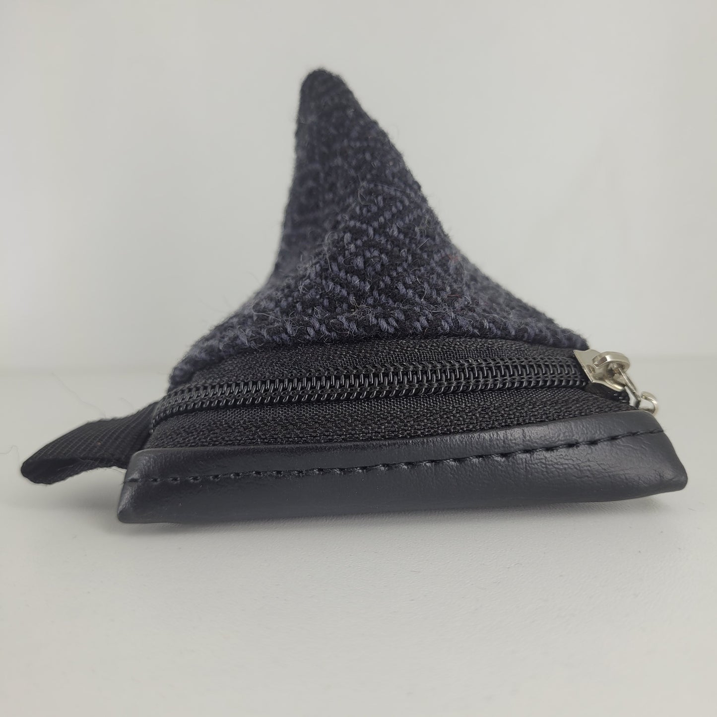 Monedero triangular (Perdiz negro)