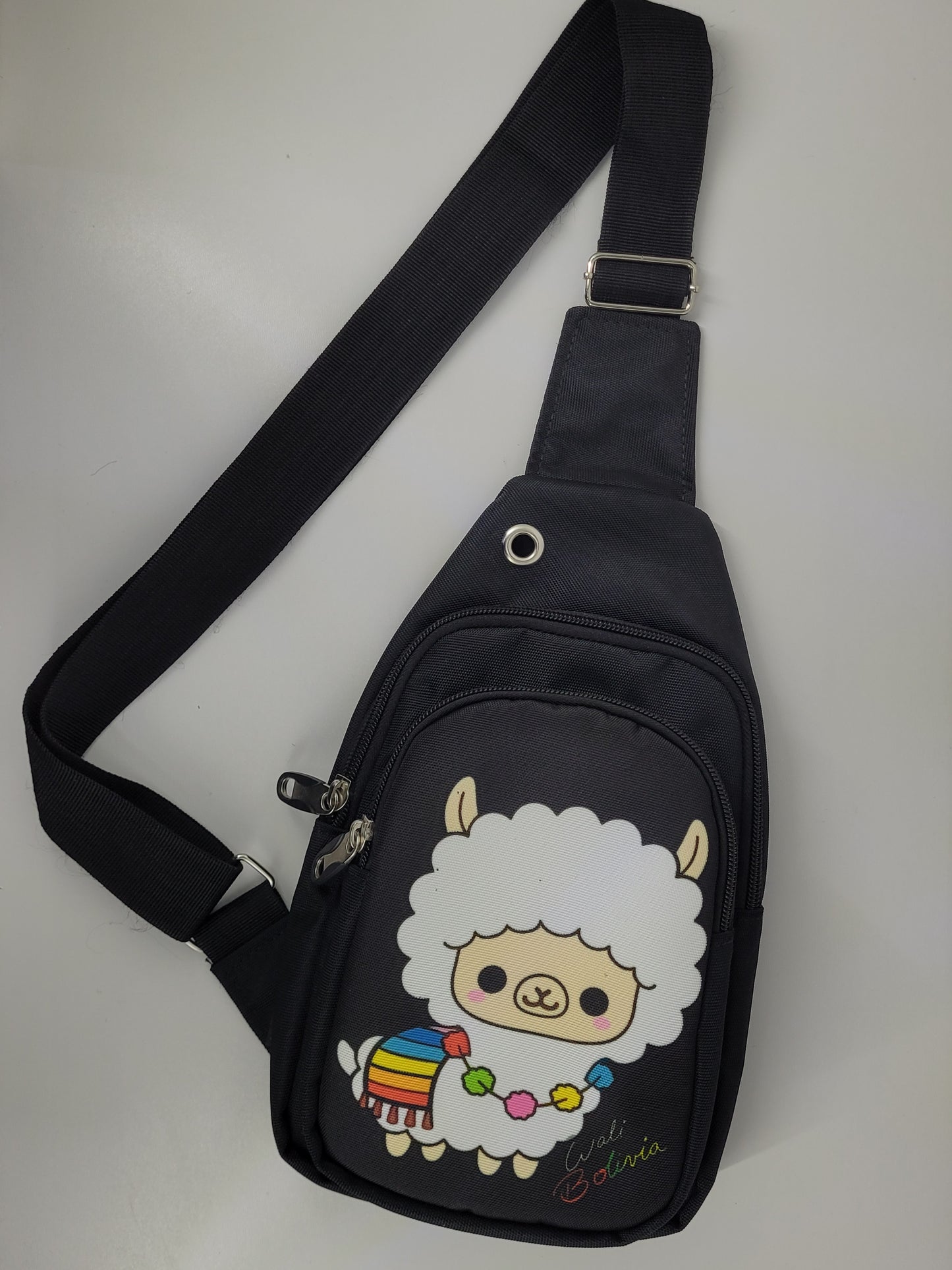 Pechera (lama de peluche)