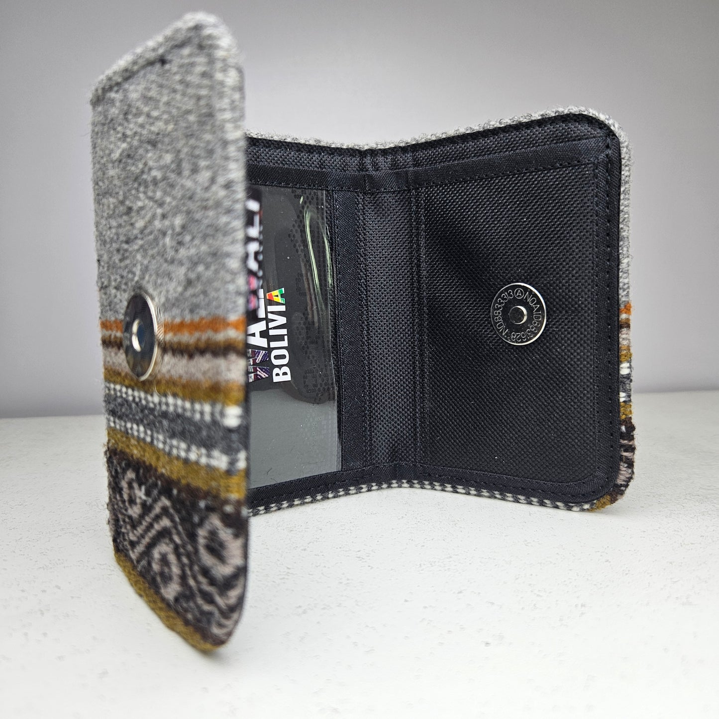 Billetera triple (plomo diseño bajo)