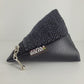 Monedero triangular (Perdiz negro)