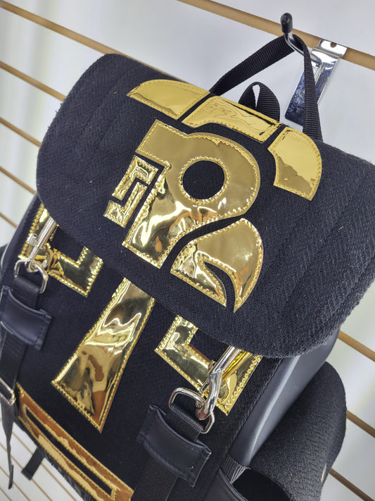 Mochila de colección Monolito (dorado)