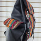 Mochila wali (negro con franjas naranja)